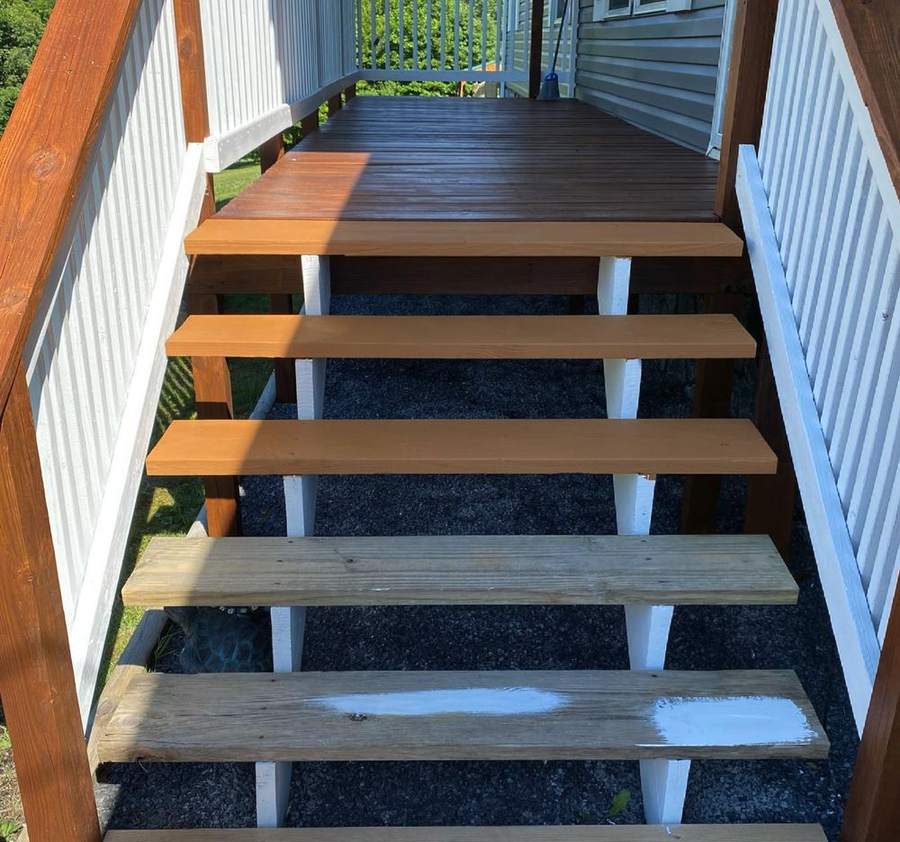 Deck stairs with some treads stained and some not yet done