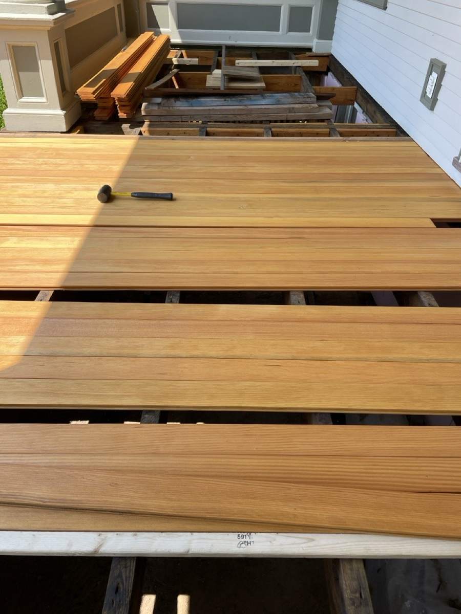 New boards partway across the porch