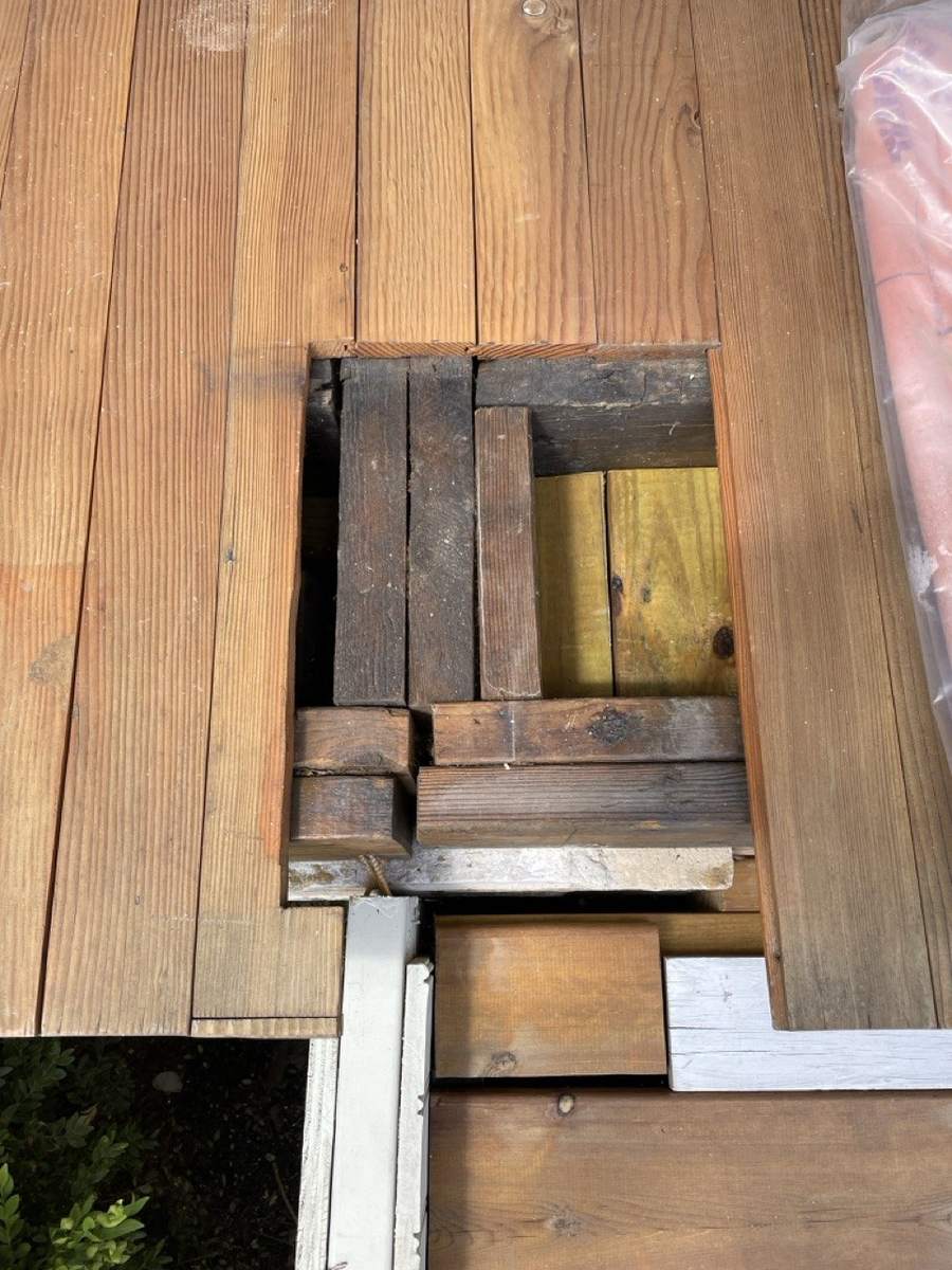 New lumber set into the porch framing at the pier