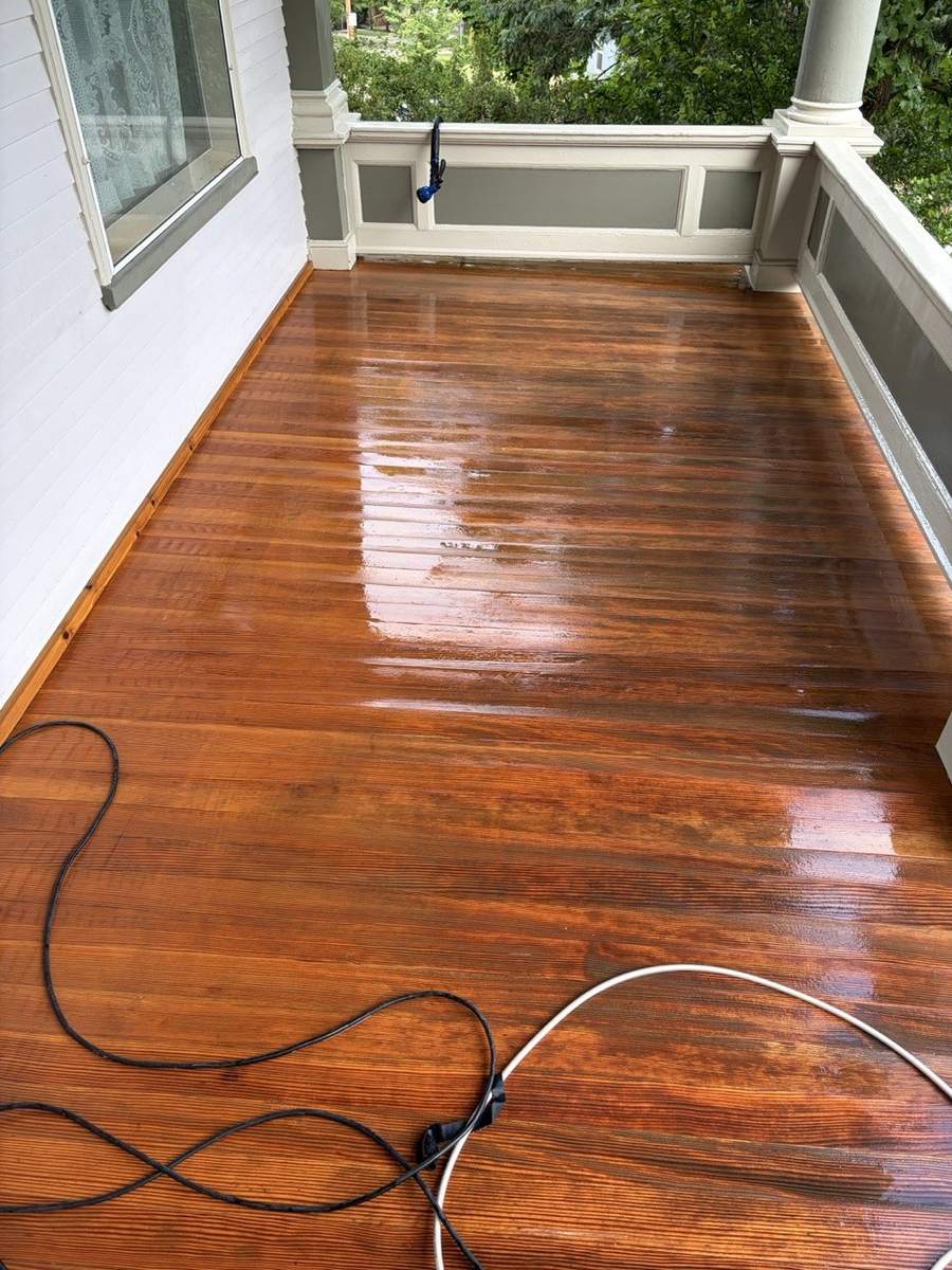 The porch floor wet from washing