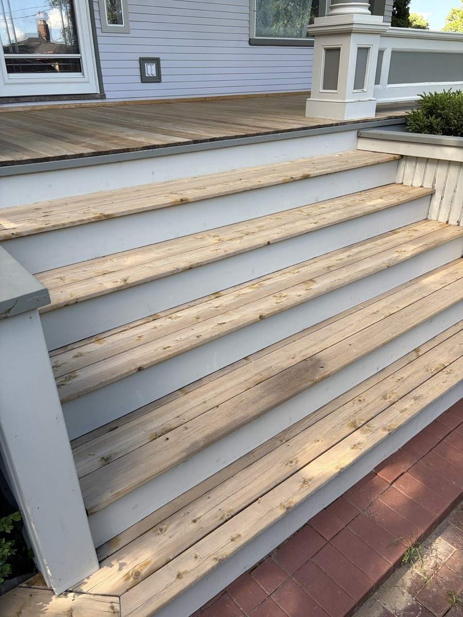 The porch steps stripped to bare wood